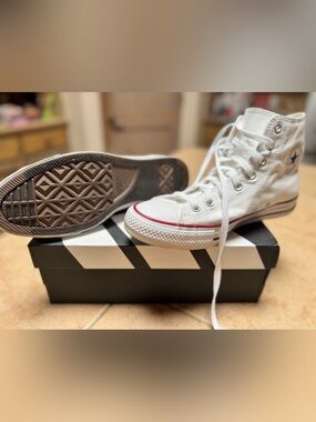 Converse men’s 8.5 White High-Top Sneakers with Red Trim 
Never worn